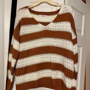 Women’s Burt, orange and white knit, sweater size medium